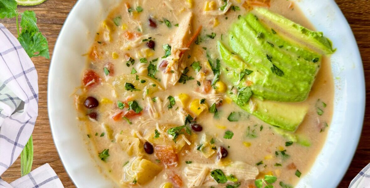 white bowl of chipotle chicken corn chowder soup