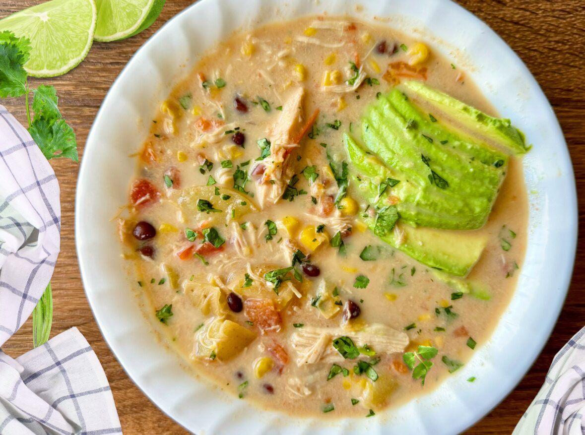 white bowl of chipotle chicken corn chowder soup