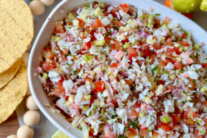 large bowl with crab ceviche and tostadas