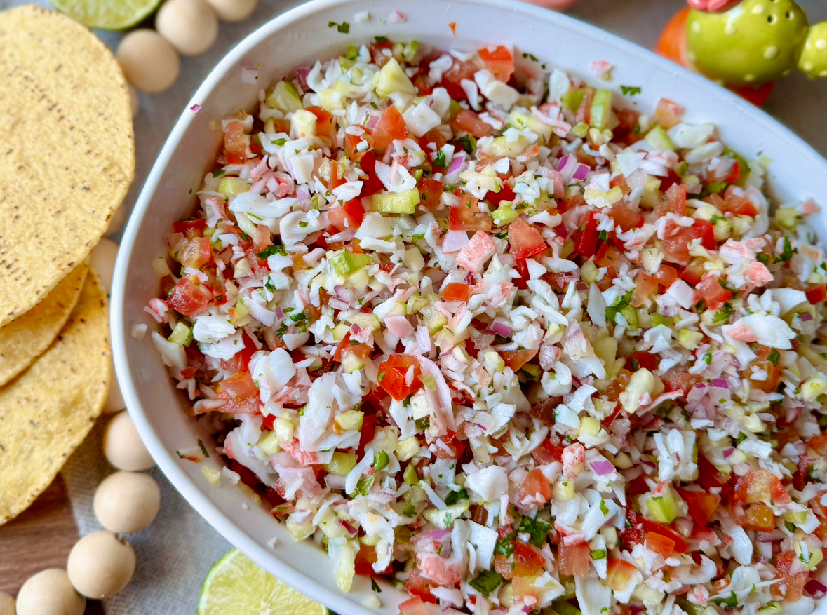 large bowl with crab ceviche and tostadas