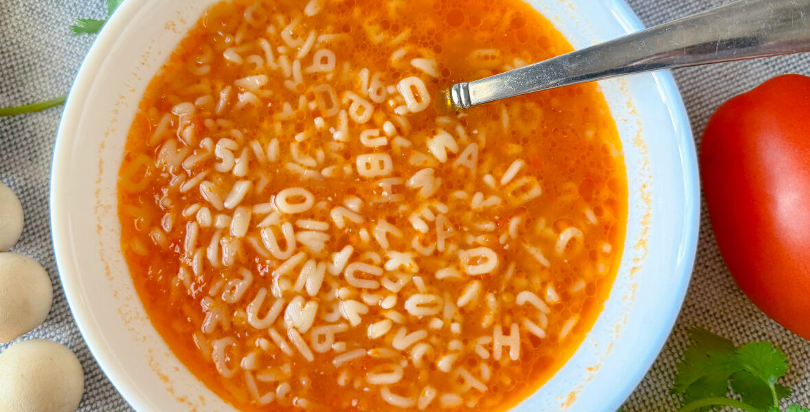 White bowl with alphabet soup