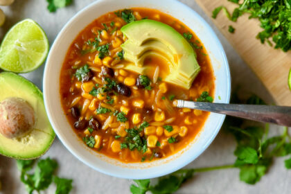 bowl of soup with black beans, corn and orzo pasta