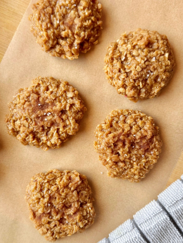 overhead shot of snickerdoodle cookies arranged neatly on parchment paper