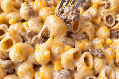 close up shot of a forkful of cheesy, creamy chipotle lime beef pasta